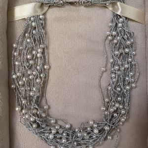 Beautiful pearl necklace on silver strands